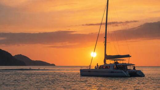 A catamaran at sunset off Tamarindo.